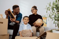 African_american_family_decluttering_AdobeStock_473998094