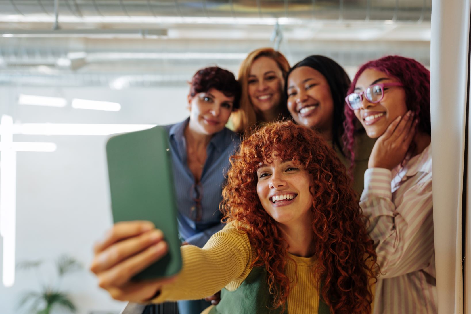 Young_women-diverse_selfie_Condensed_shutterstock_2558515673